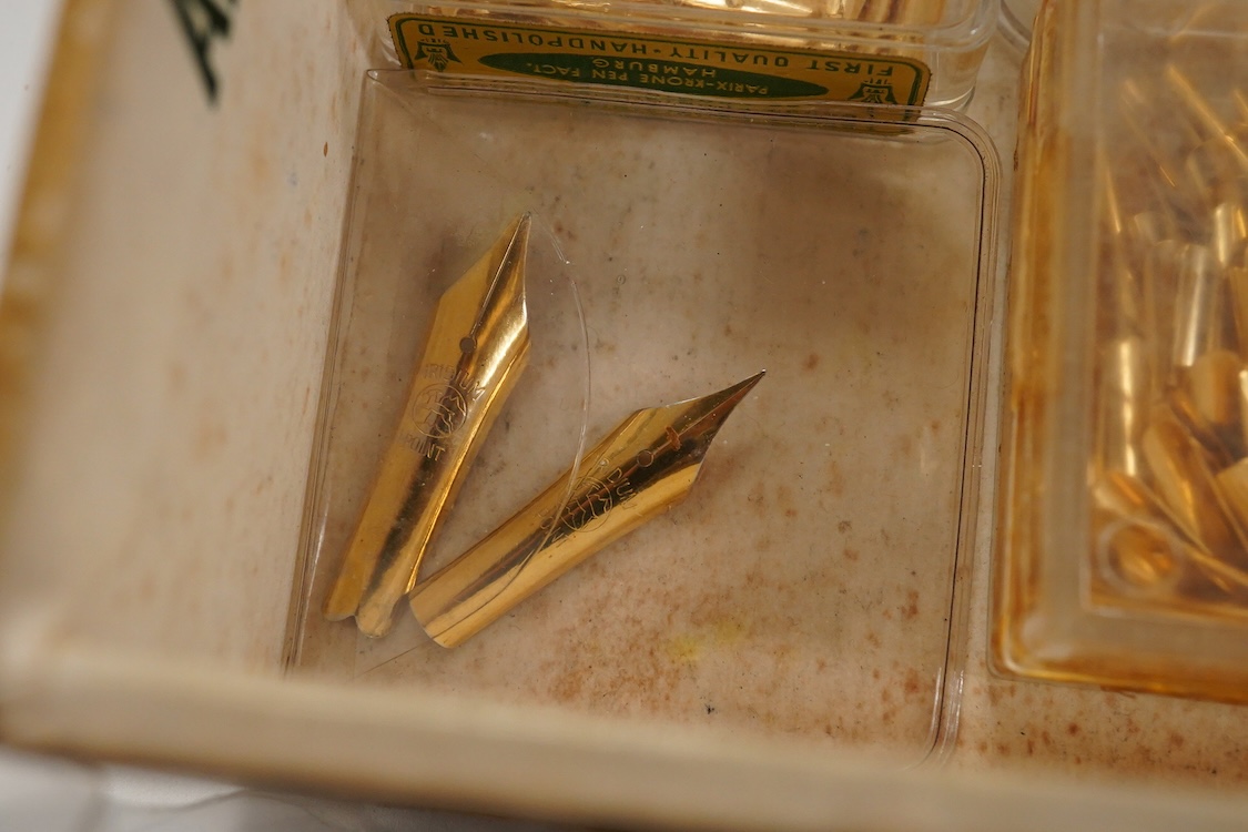 A large collection of fountain pen gold plated nibs / sections from various makers